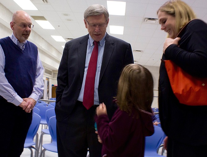 (From right) Karen Caruth, mother of first-grader Cleary Caruth, thanks Dranesville District Supervisor John Foust, and Bob Fuqua, the school’s principal, for making progress on the sidewalk projects. Foust told Cleary to email him photos of her riding her bike on the sidewalks once they are finished.
