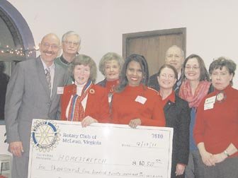 From left: Christopher Fay, Executive Director of Homestretch; Gerry Hamilton of Vienna; Jan Auerbach of McLean; Carolyn Chappell of Fairfax; Ingrid Parris-Hicklin of Tysons; Lynn Heinrichs of McLean; Chuck Pascoe of Burke; Susan Lydick of Bailey's Crossroads; and Diane Hill of Falls Church. The Rotary clubs of Alexandria, Rosslyn/Fort Myer, and Reston representatives are not pictured.