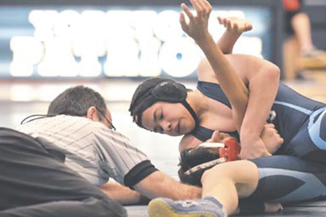 Yorktown freshman Rene Fuentes competes against Herndon on Jan. 14. Fuentes received the team's outstanding wrestler award for the meet. The Patriots won, 45-22.