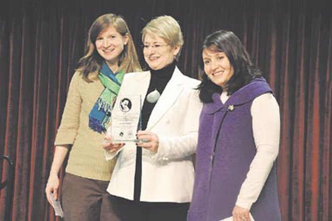 From left, Mandy Guernsey, Gillian Sescoe and Abby Kimble. Guernsey and Kimble, of Reston Interfaith, presented Sescoe with the 2012 Dr. Martin Luther King Jr. community service award at the Reston Community Center Monday, Jan. 16. 