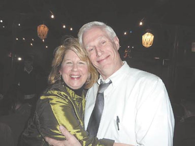 RCP's Sue Pinkman, left, is congratulated by producer and director Eddie Page on her WATCH Award nominations at the Birchmere Jan. 15.