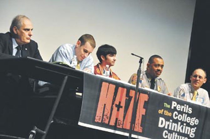 From left, Jeff Levy, president of Virginia College Parents, Casey Lingan of the Commonwealth’s Attorney, Ryan Smith, a graduate student at Virginia Tech, Capt. Bruce Ferguson, commander of Fairfax County Police Youth Services Division and Dr. William Hauda, emergency physician, members of a panel discussion on college drinking at McLean High School Wednesday, Jan. 11. 