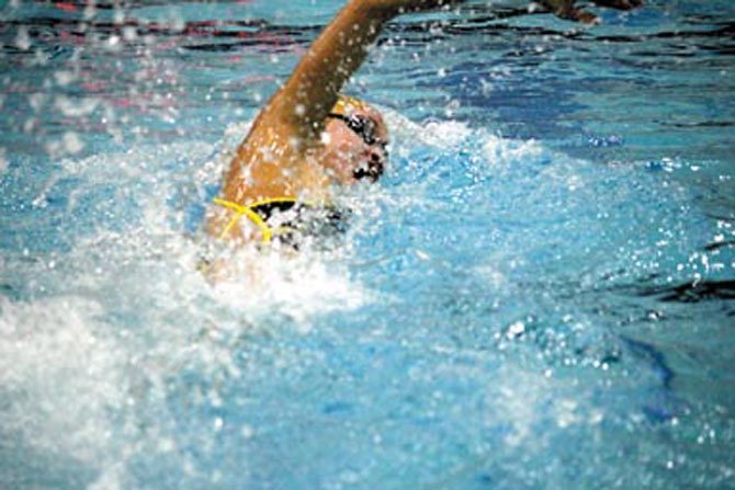 Janet Hu competes in the 200-free event during Oakton's victory over Chantilly. 