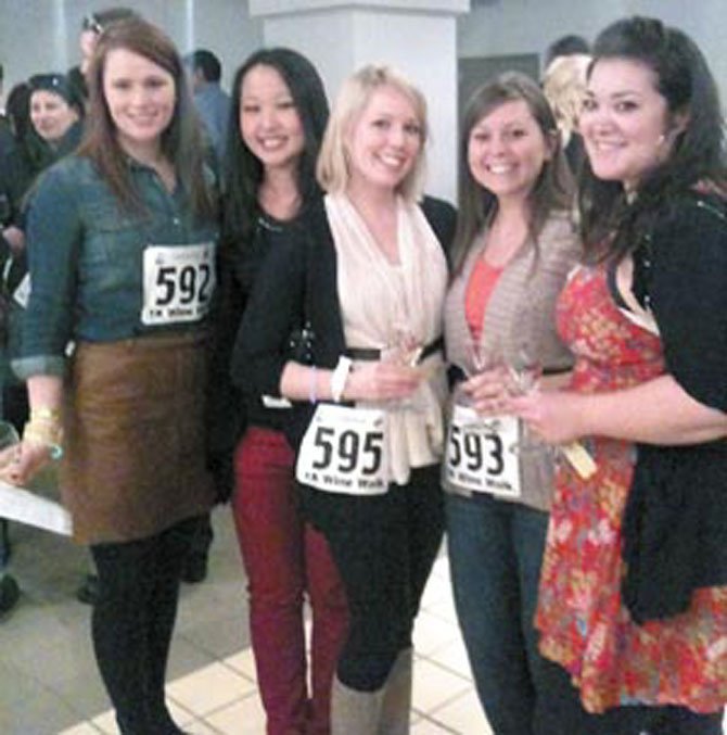 Lindsey Sharpe, Ava Maher, Cammy Contizan, Christy MacPherson and Tiffany Payne finish strong at the second annual 1K Wine Walk at the Crystal City shops in Arlington. 