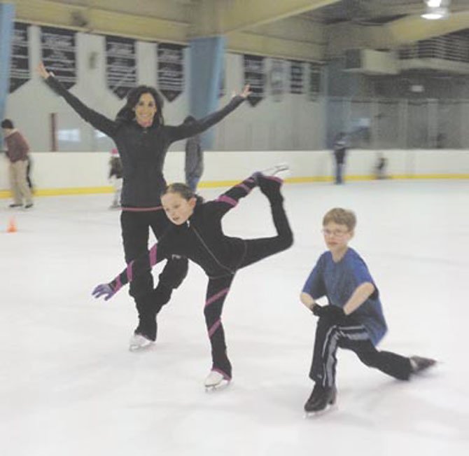 Emme Porter and her students Ava Dempster, 8, and Griffin Sendek, 12, enjoy the ice. The Mt. Vernon RECenter has made a commitment to provide ice time for diverse activities including hockey, free skate, and public sessions.