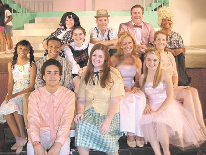 Back row, from left, are “Hairspray” cast members Joe Philipoom, Mike Cash, Michael Clendenin and Taylor Young; in middle, from left, are Madeline DeFreece, Chaz Coffin, Amanda Mason, Cathy Arnold and Ellen Woodstock; and front row, from left, are Cole Smith, Brittany Washington and Taylin Frame.