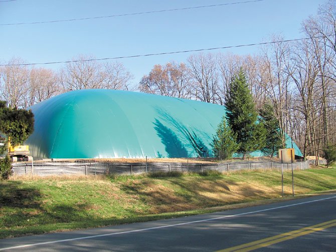 The green tennis bubble on Oaklyn Drive is a source of continuing controversy.