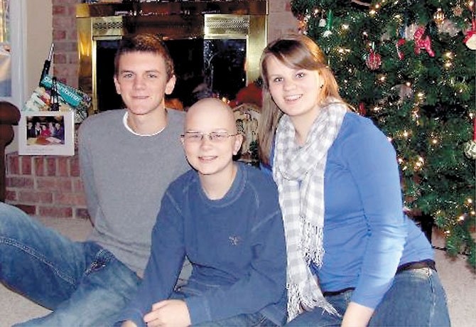 From left: Siblings Michael, Andrew and Sara McCaffrey during Christmas 2011.