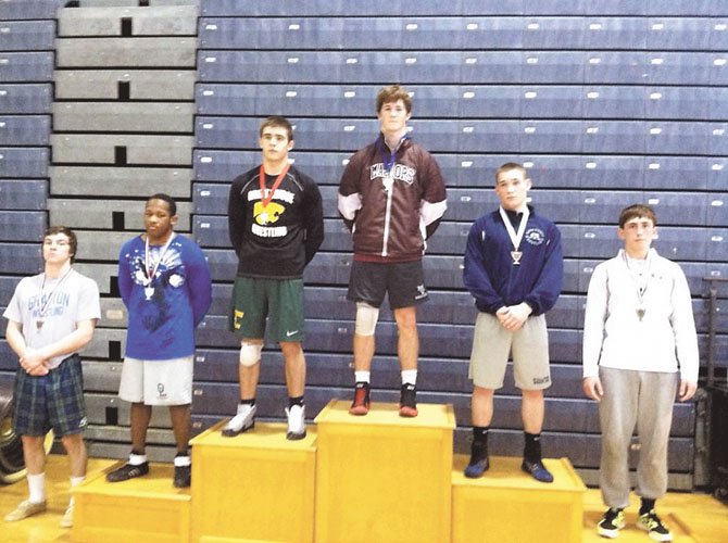 Mount Vernon senior Dusty Floyd, middle, placed first in the 170-pound weight class at the Ocean Lakes Invitational on Jan. 27-28. Floyd became Mount Vernon’s all-time leader in wrestling victories on Jan. 25 when he earned win No. 148.