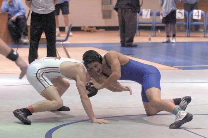 South Lakes wrestler Ryan Forrest (right) is hoping to make a run at Liberty District and Northern Region crowns over the next two weeks.