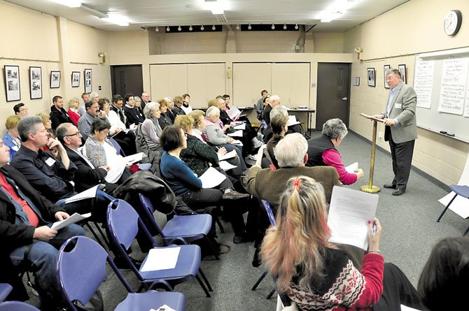 Jerry Hopkins speaks to a group of people interested in helping plan for aging in the community at the McLean Community Center Monday, Jan. 30.