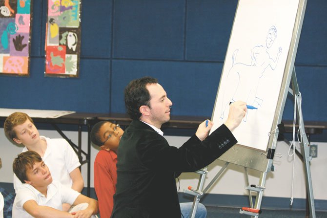 Above: Marc Tyler Nobleman sketches a centaur as he addresses sixth-grade students (from left) Tom Mangan, Charles Sullivan, and Joshua Davidson at Washington Episcopal School on Dec. 7. 