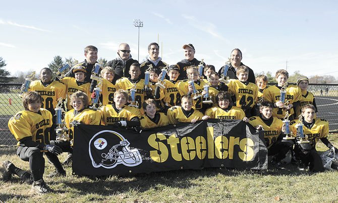 Dave Humiston's football team wins the championship Superbowl, played at Bullis School on Saturday, November 19, 2011, in Potomac, MD.  (Photo by Leslie E. Kossoff/LK Photos)..