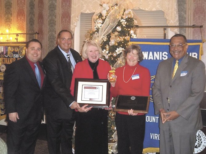 From left are Mount Vernon Kiwanis Club President Dr. Dave Reynolds, member Greg Engelking, member Joanne Malkin holding UCM Award, awardee Pam Beggan holding MVKC award, and UCM representative Marcos Castillo. 