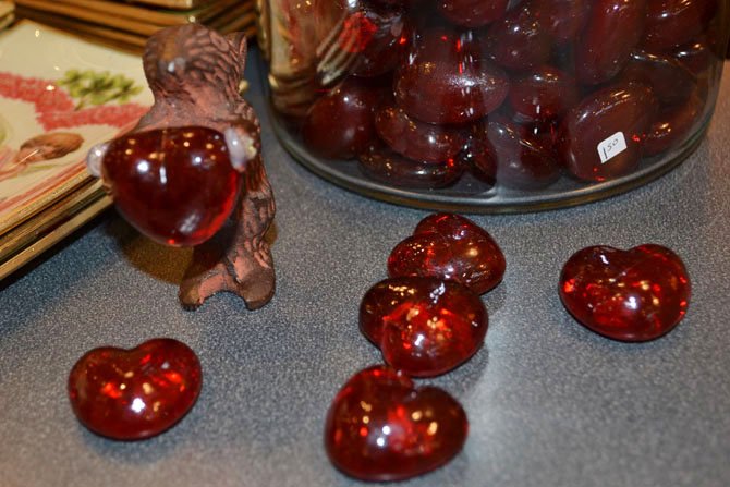 Designers say subtle home accents like valentine-themed small glass hearts can be used to express affection for family and friends.