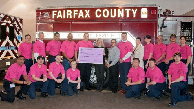 Fire Chief Ronald Mastin of the Fairfax County Fire and Rescue Department presented a check for $2,000 to Liz Davey, the American Cancer Society’s Vice President on Jan. 30, for the fight against breast cancer. 