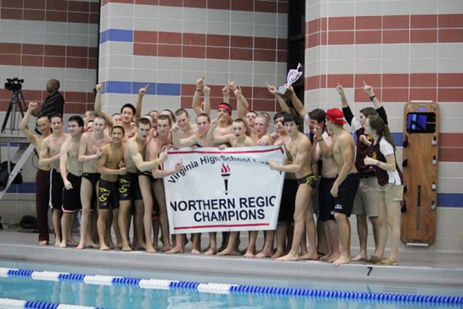 Both the Oakton girls’ and Oakton boys (pictured) awim teams were crowned Northern Region champions this past Saturday night at Oak Marr Recreation Center.