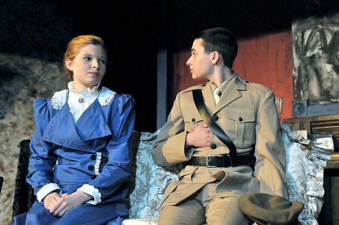 Emma Harris as Helen Stoner talks with her fiancé Captain Louis Armitage (Ian Munro) before joining the others for a luncheon at Dr. Roylott’s home.