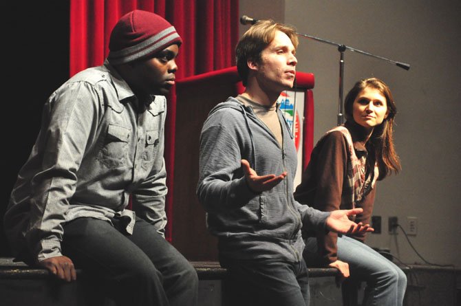 From left, Kervin Germain, Casey Preston and Amie Cazel of Deana’s Educational Theater speak about the realities of teen dating abuse at McLean High School Thursday, Feb. 9. 