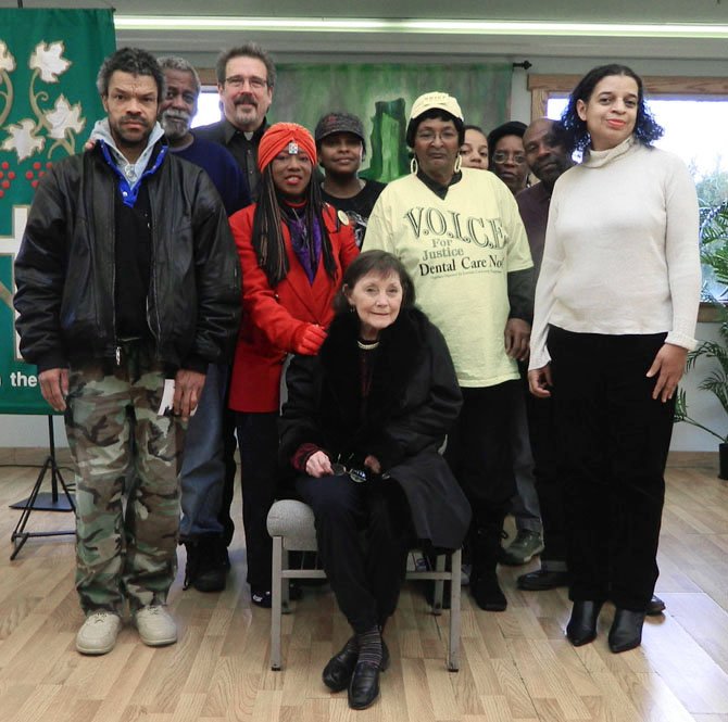 State Sen. Toddy Puller (seated), who visited Rising Hope Sunday, called legislation requiring drug tests for people receiving Temporary Assistance to Needy Families “mean-spirited.” 