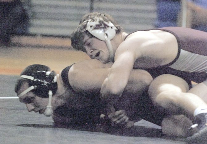 Mount Vernon senior Dusty Floyd, top, captured the 170-pound Northern Region wrestling championship on Feb. 11 at Hayfield Secondary School.