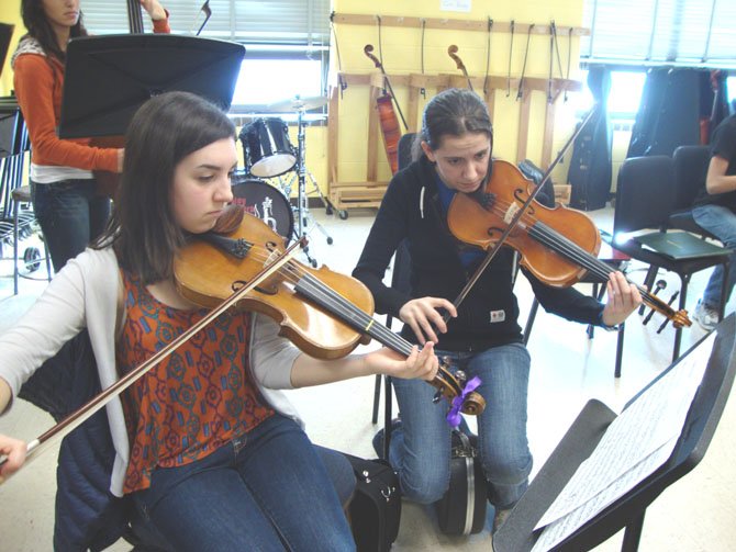 Sarah White and Kathlyn Silverman, violas.