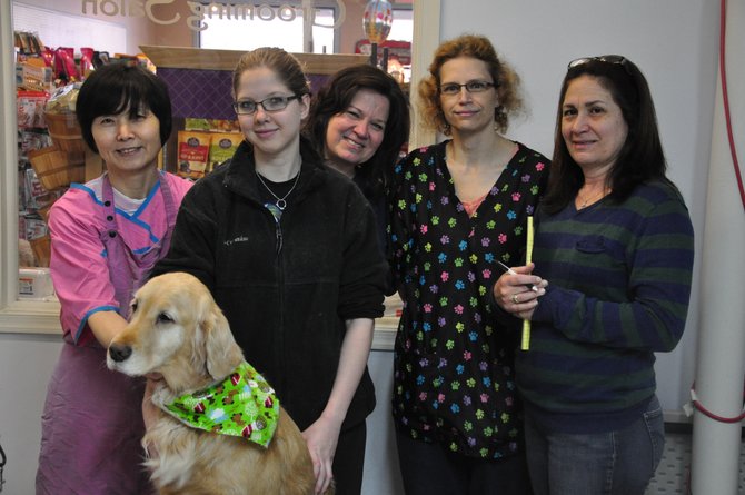 The staff of Great Dogs of Great Falls, which offers pet food, toys, accessories and grooming services. 
