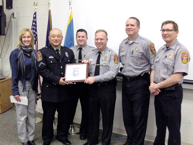 From left are CAC Chairman Leslie Jenuleson; PFC Roy Choe; 2nd Lt. Ryan Morgan; Capt. Purvis Dawson, commander, Sully District Station; Lt. John Trace, assistant commander, Sully District Station; and Major Jack Hurlock, commander, FCPD Patrol Bureau, Division I. 