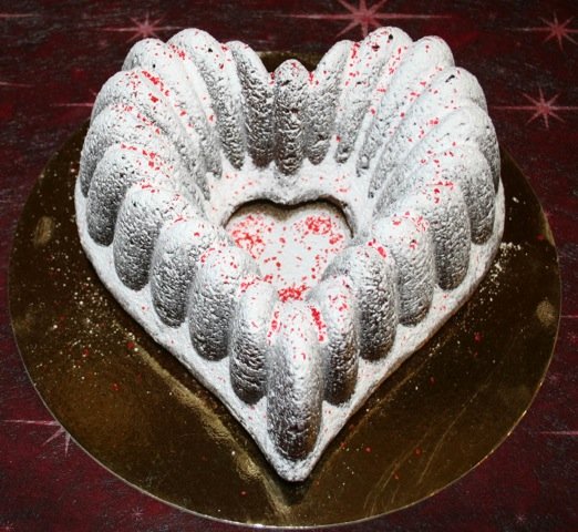 A heart-shaped chocolatey cake.