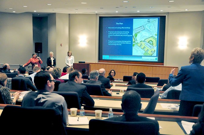 From left, Bailey Hopple of JBG Companies, Patti Nicoson, Dulles Corridor Rail Association and Maggie Parker of Comstock Partners answer questions about redevelopment along the Silver Line Friday, Feb. 24. 