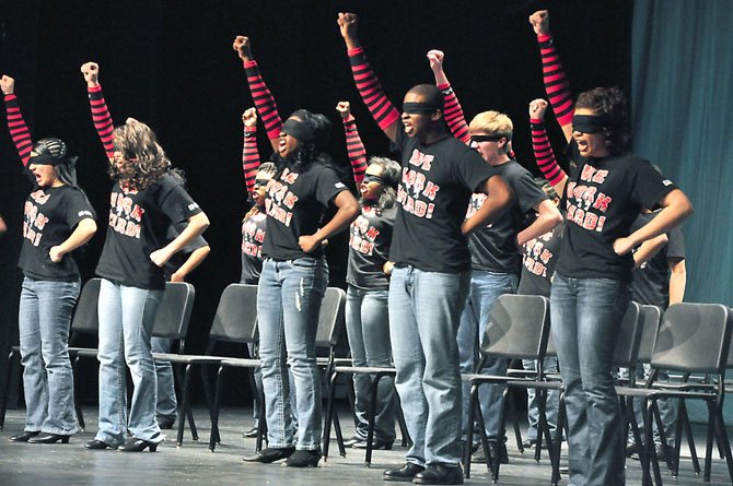 The Herndon High School Step Team don blindfolds for part of their performance at the 14th annual Herndon StompFest Saturday, Feb. 25. 