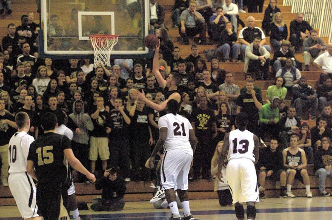 With the Westfield student body cheering him on, Zach Elcano goes up for a close range score in the title game that was played at Robinson. 