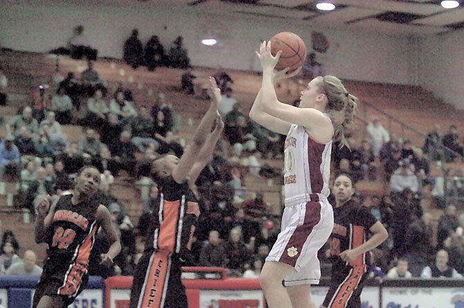 Katherine Coyer scored 12 of her 22 points during the third quarter of the Cougars’ win over Monacan.