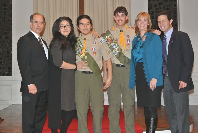 From left, parents Jim and Maria Fusco with Eagle Scout Michael Fusco, and Eagle Scout Jeff Bass with parents Pam and Barry Bass.