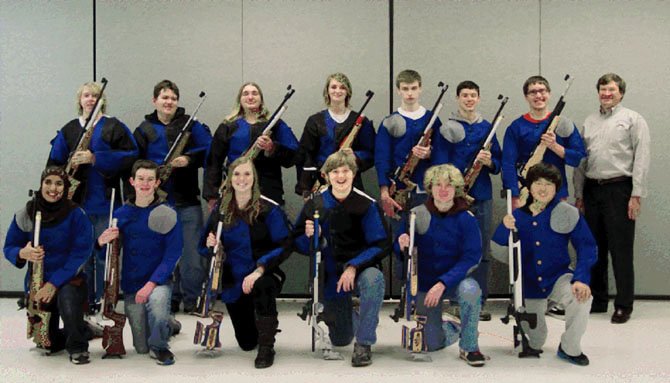 Members of the West Potomac rifle team: (kneeling) Harmain Rafi, Jack Apperson, Lindsay Paul, Andy Knight, Mischa Michael, Ian Nakayama, (standing) Matt Karau, Matt Jagg, Celeste Zabowski, Jordan Grafton, DJ Whetzel, Russell Bradley, Jack Wilson and Leonard Paul.