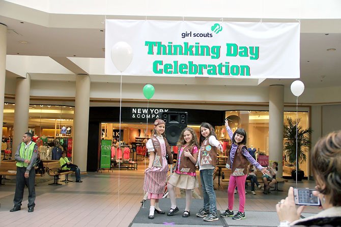 Striking poses, Gracyn Redding, Amelie Mohn, Autumn Arencibia and Camila Lopez, members of Brownie Troop 6320 from Rolling Valley Elementary School in Springfield, enjoyed performing a skit about Germany on the main stage when area Girl Scouts recognized their 100th Anniversary during a special Thinking Day Celebration at Springfield Mall on Saturday, Feb. 18.

