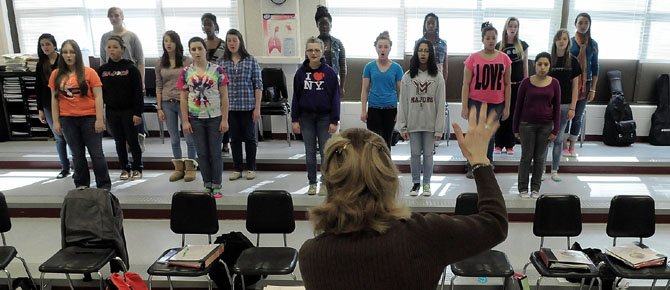 Choral director Judith Belzer leads the advanced women’s chorus in “Veni, Sancte Spiritus” by Andrea Ramsey. The chorus members are: Desha Brown, Sarah Busch, Lily Chong, Rebecca Dyson, Lizett Giron, Elizabeth Gregory, Savanna Lindsay, McKenzie Moore, Gilda Nimoh, Elle Parks, Catherine Perryman, Aylana Randall, Catherine Ray, Gabrielle Salvado, Brooke Scutt, Alliyah Stevens, Ashley Vanlandingham, Jessica Viera, De’ja Wanzer and Gabrielle Wineberger.