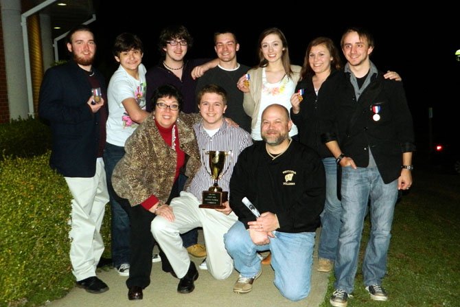 The “Oleanna” cast and crew with their trophy and medals (front row, from left): Theater Director Susie Pike, play director Joey Biagini and Westfield Principal Tim Thomas; (back row, from left) Perry Cowdery, Alex Mann, Joe Drzemiecki, Mitchell Buckley, Madeleine Bloxam, Allie Koenigsberg and Dieter Stach. (Not pictured: Corinne Holland.)