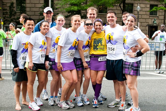 BethAnn Telford, in yellow T-shirt and knee socks, in May 2011 at the Race for Hope in Washington, D.C.