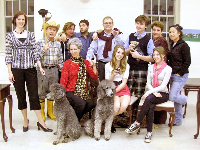 The cast of “Maid for Dogs,” (standing, from left) Stephanie Lawrence, Charles Hoffman, Elizabeth Vittori, Walid Chaya, Jim Manchester, Maxwell Snyder, Helen Rusnak and Charlotte Yakovleff, and (sitting, from left) Lynne Strang, Andie Matten and Roxy Matten. Dogs are Abby and Izzy.
