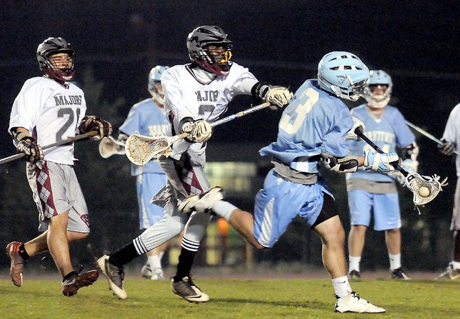 Yorktown senior midfielder Martim Cohen possesses the ball against Mount Vernon on March 16.