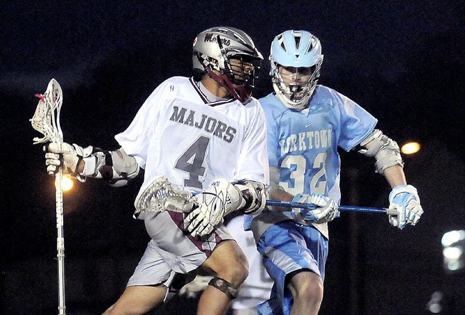 Yorktown junior Jonathan Shears, right, defends Mount Vernon senior Shoshone Smith on March 16.