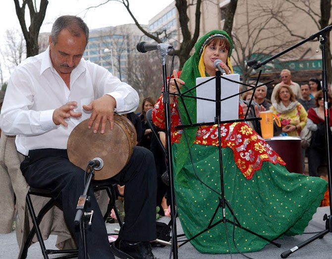 Iranian-American folk musicians performed traditional music for the large crowd.