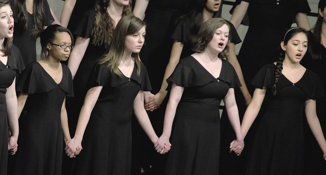 The Robinson Select Women’s Ensemble performs during the annual Robinson Secondary Choral Department Performance Assessment Concert on Tuesday night.