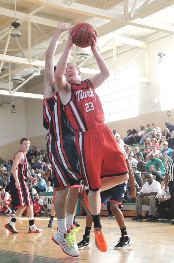 Centreville High’s Evan Fuller (23), one of the top players in the Concorde District this past season, makes a hard drive to the basket at Saturday’s All-Star extravaganza. Fuller tallied nine points in the game.