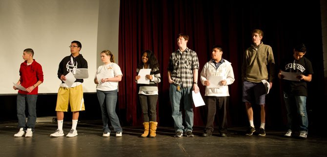 On Feb. 23 Chantilly High School students stand on stage at the school after receiving “On-A-Roll” certificates acknowledging special efforts they have made to overcome obstacles — either academic or personal — in the quarter. 