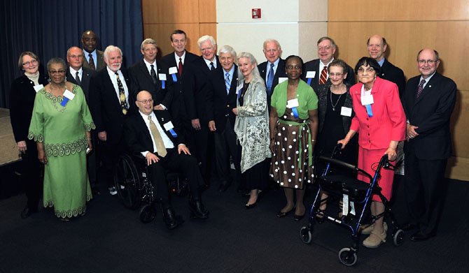 The Legends of 2012: L-R First Row, Lillian Patterson, Mike Oliver, Al Grande, Allen Lomax, Bill Kehoe, Rep. Jim Moran, Harry "Bud" Hart, Wendy John, Gwen Menefee-Smith, Living Legends director  Nina Tisara, Dorothy Turner; L-R Second Row, Pat Miller, Jimmie McClellan, Mayor Bill Euille, Bob Calhoun, Joe Shumard, Eugene Steurele and Master of Ceremonies John Porter.
