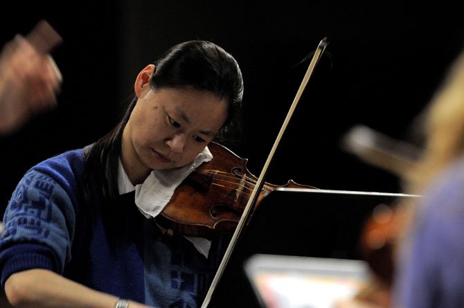 Violinist Midori performed with students from T.C. Williams High School in March.