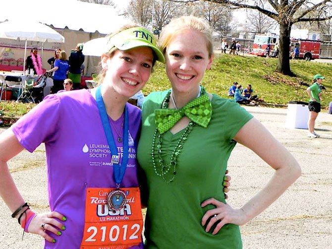 Mary McLaughlin (on left) at the half-marathon with her sister, Sarah, who came from Philadelphia to cheer her on.