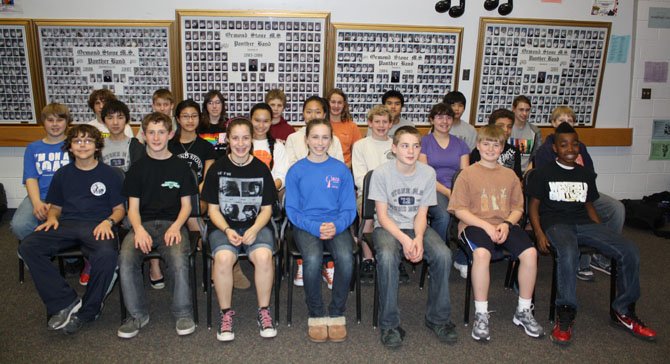 Under the direction of Robert Zazzara, the Stone Middle School Jazz Ensemble participated in the 32nd Annual Chantilly Invitational Jazz Festival on March 16. They received a "Superior" rating for their performance and received a second place trophy out of five middle school performing groups. First row, from left: Michael Baylock, Donovan Davis, Mikenna Moore, Casey Comer, Britain Bangerter, John Dickenson, Christian Nunley; second row: William Dzubak, Christopher Hoffman, Sarah Shim, Catherine Corradino, Sydney Park, Garrett Anderson, Nicole Ruckert, Austin Porter, Sean Luffy; third row: Alex Jorgensen, Thomas Lattomus, Lauren Mannikko, Cole 	Sorrells, Chloe 	Hicks, John Nguyen, Samuel Kim and Kathryn Mozell. Absent: Connor Charters. 